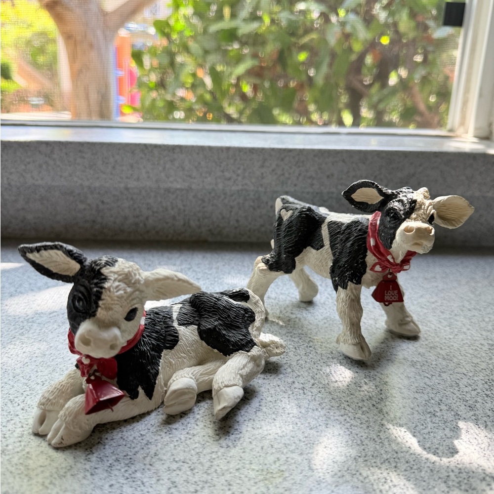 Vintage pair of Charming Black and White Cow Figurines
